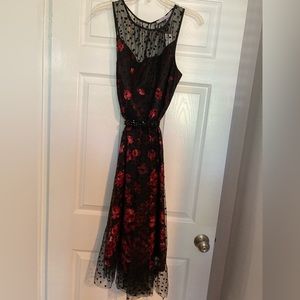 Carmen Marc Valvo size 12 black polka dot with underlining red roses.
